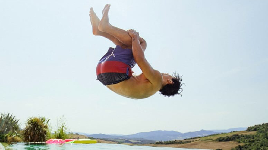 A man jumping into water; image used for home&Away page.