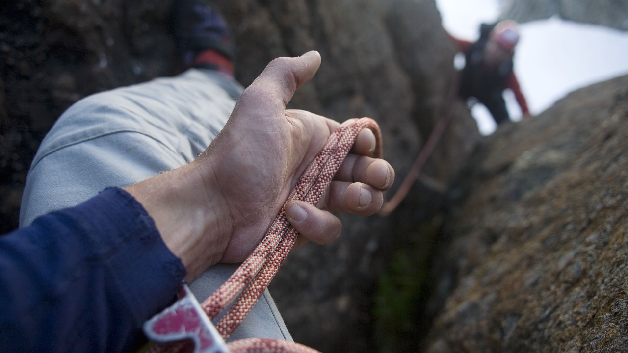 rope threaded through a belay device